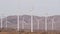 Windmills on wind farm, wind mill energy generators. Desert windfarm, USA.