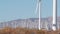 Windmills on wind farm, wind mill energy generators. Desert windfarm, USA.