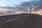 Windmills and winding road in the open, 3d rendering