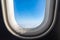 The window of the airplane. A view of porthole window on board an airbus for your travel concept or passenger air transportation