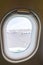 The window of the airplane. A view of porthole window on board an airbus for your travel concept or passenger air transportation