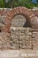 Window in The ancient Thermal Baths of Diocletianopolis, town of Hisarya, Bulgaria