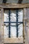 A window as a detail in an old restored barn.