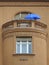 Window and balcony with blue sunshade