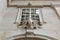 Window with bas relief at Salzburg Cathedral, Austria.