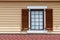 Window with brown shutters