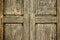 Window with closed weathered wooden shutters