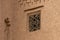 Window with decorative lattice of the Kasbah Amridil, Ouled Yaacoub, Skoura.Morocco