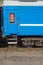 Window and door of the blue locomotive wagon.