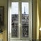 Window with Eiffel tower in Paris