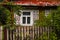 Window and fence in one of the houses in the Land of Open Shutters, Podlasie