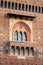 A window of Filarete historical Tower with beautiful bricks