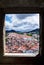 Window framed overview of Castelo de Vide