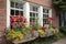 window garden filled with colorful annuals and perennials