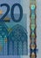 Window in Gothic architecture and security features on 20 euro banknote obverse