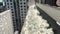 Window insulation process. Man applies spray foam on windowsill