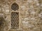 Window of Islamic architecture mosque window Ottoman period stone facade