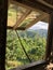 A window made from wood and tin on a remote area