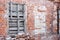 window of old abandoned decaying house