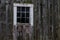 A window on an old New Hampshire barn