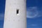 Window of old Paphos lighthouse white wall and blue sky,Cyprus