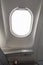 Window and seat inside airplane