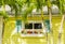 Window with shutters of a sunny simple house