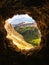 Window into the soul. Dreamy time into the mountains. Perfect scene from high mountain cave.