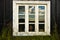 Window of traditional Icelandic house at Skogar