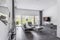 Window in trendy grey living room interior of suburban house