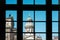 Window view on historic French Cathedral / Dome at Gendarmenmarkt, Berlin