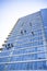 Window washers wash windows of high-rise buildings as the climbers descended and climbing on fixed ropes