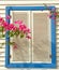 A window with white shutters and pink bougainvillea flowers on a sunny warm day.