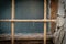 Window with window bars on a rundown house