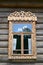 Window in an wooden peasant house