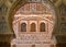 Windows in arabic arch, front of the 14th century Alcazar royal palace, Mudejar architecture style, Andalusia