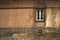 Windows with arch relief on forgotten decaying wall