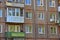 Windows and balconies on facade of prefabricated house