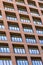 Windows and balconies of the multi-storey building