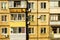 Windows and balconies of the old condominium.