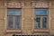 Windows with carvings of wooden house