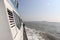 Windows of a cruise ship. Air conditioned passenger ferry on a voyage to tropical islands and beaches.