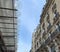 Windows, eaves, cornice, columns of the building shows the art and architecture of Paris