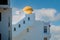 windows and golden cupula of a typical Arab construction