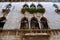 Windows of a house with flowers, architecture part house facade