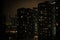 Windows illuminated in apartments and skyscrapers in Chicago at night