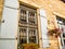 Windows with open shutters in an old Greek house. Limassol, Cyprus