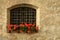 Windows with red flowers in the centre of Brixen/Bressanone. Bolzano. Italy.