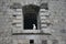 Windows in the stone walls of the fortress Mamula.