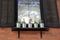 Windowsill of country home with five little pots of flowers for decoration